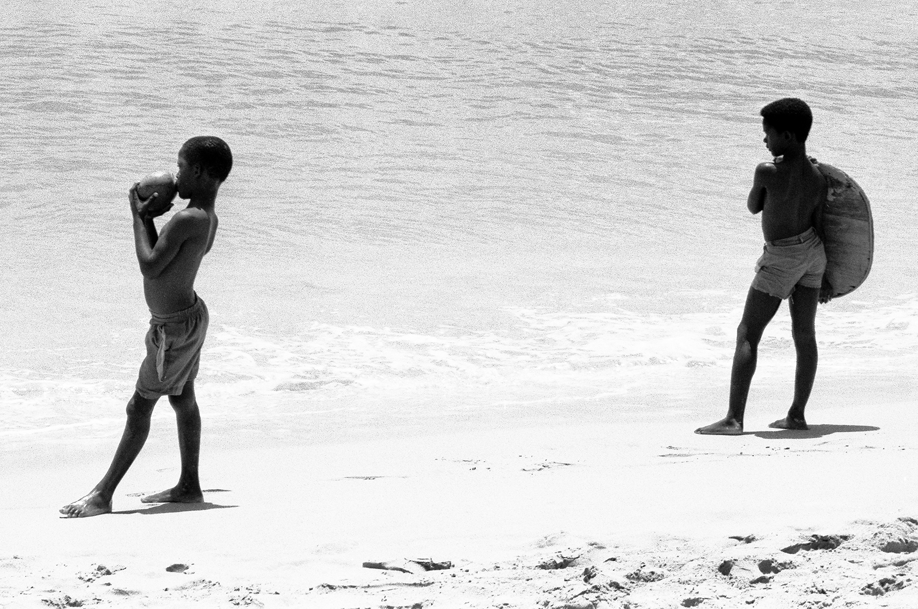 Photos by Francesca Phillips of boys playing on the beach in Barbados