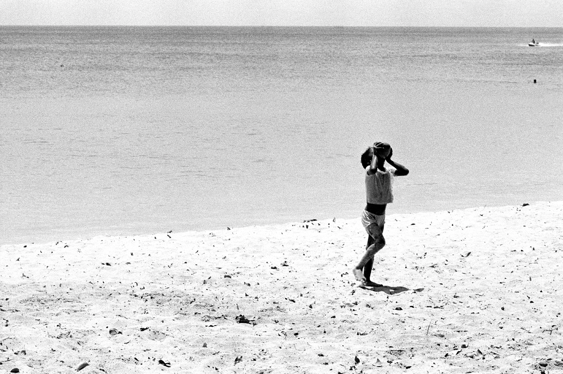 Photos by Francesca Phillips of boys playing on the beach in Barbados