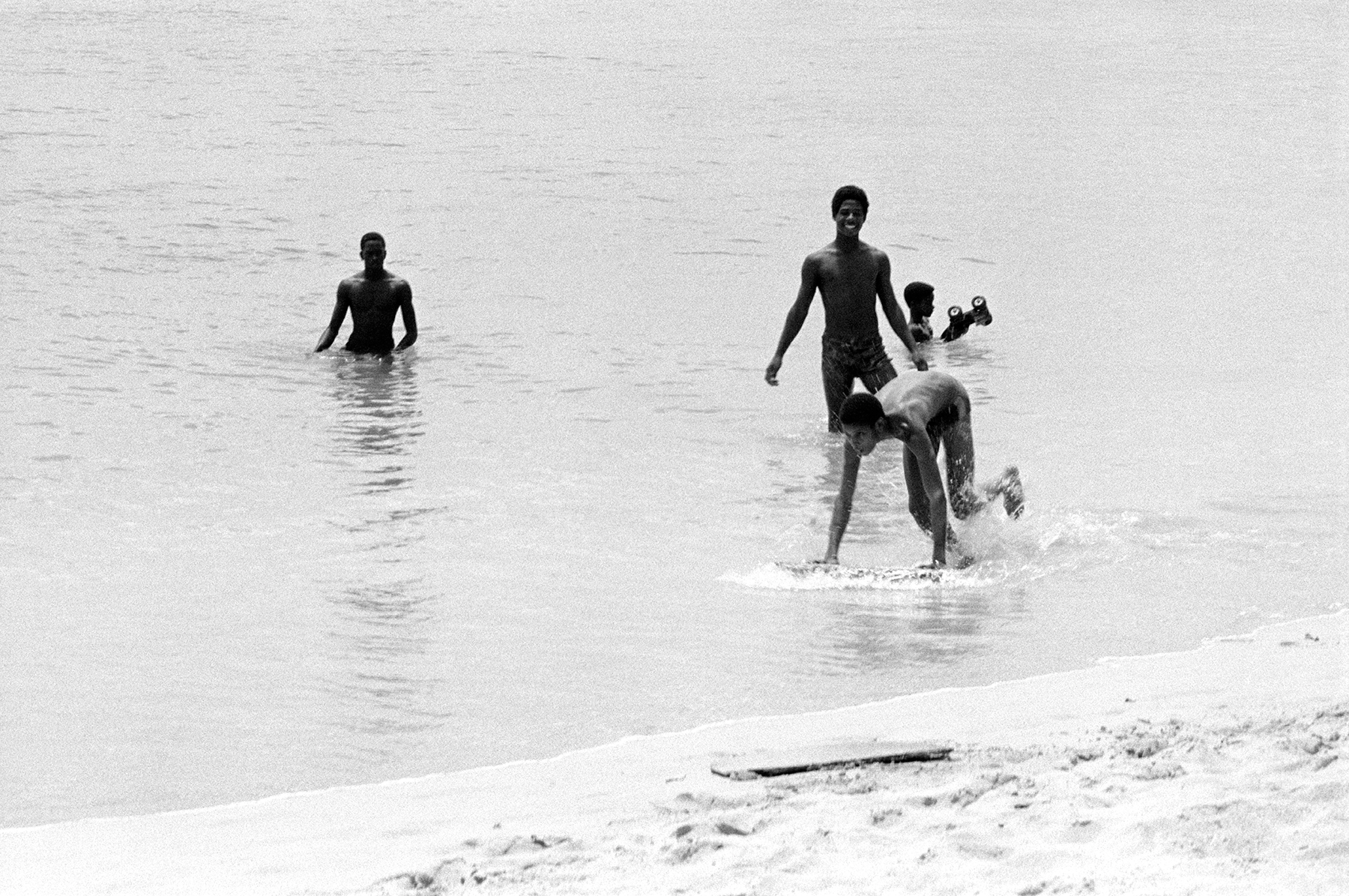 Photos by Francesca Phillips of boys playing on the beach in Barbados